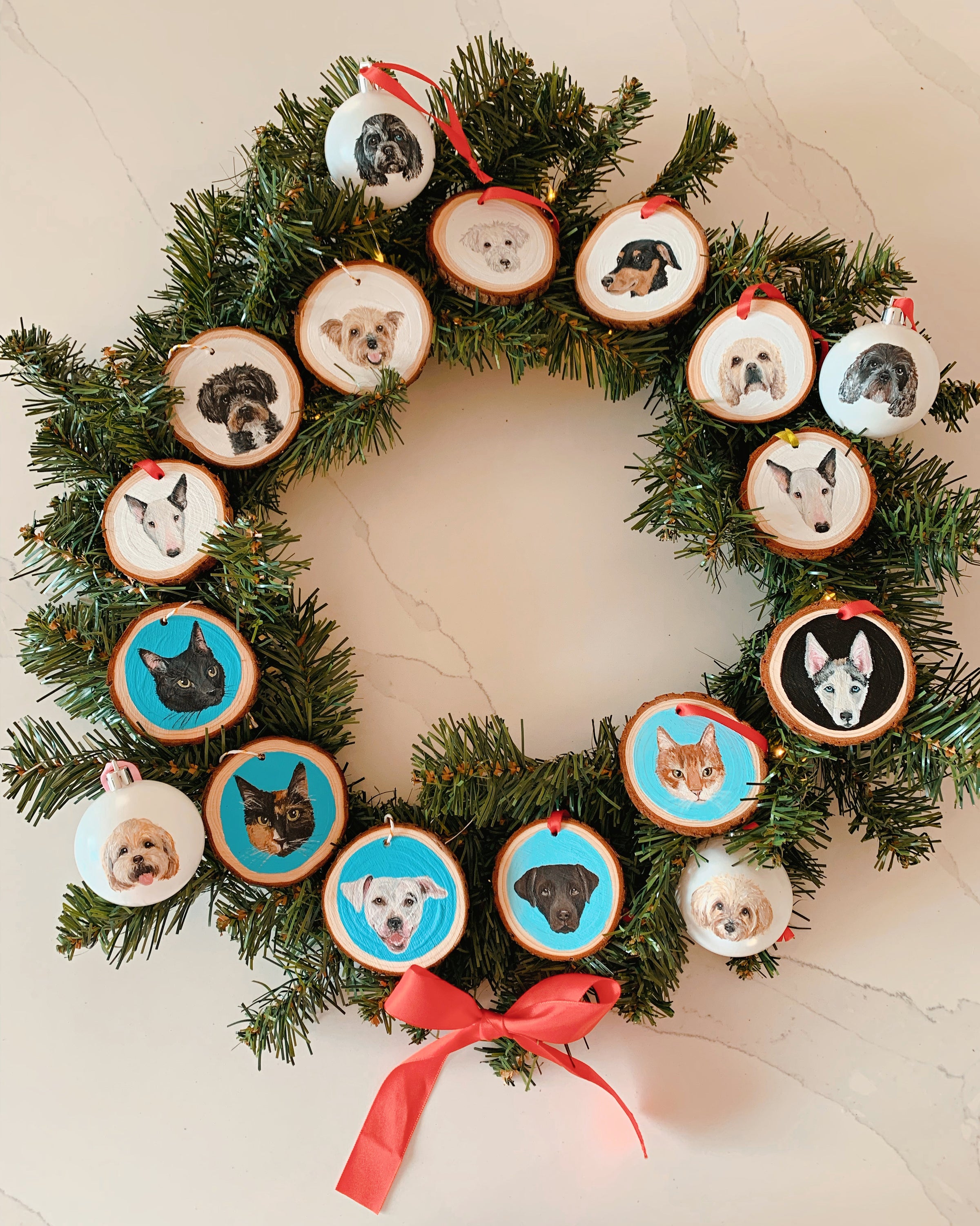 hand painted ornaments on christmas wreath by pet portrait artist sabrina pougnet